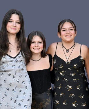 Isabella Damon with her sisters. 
